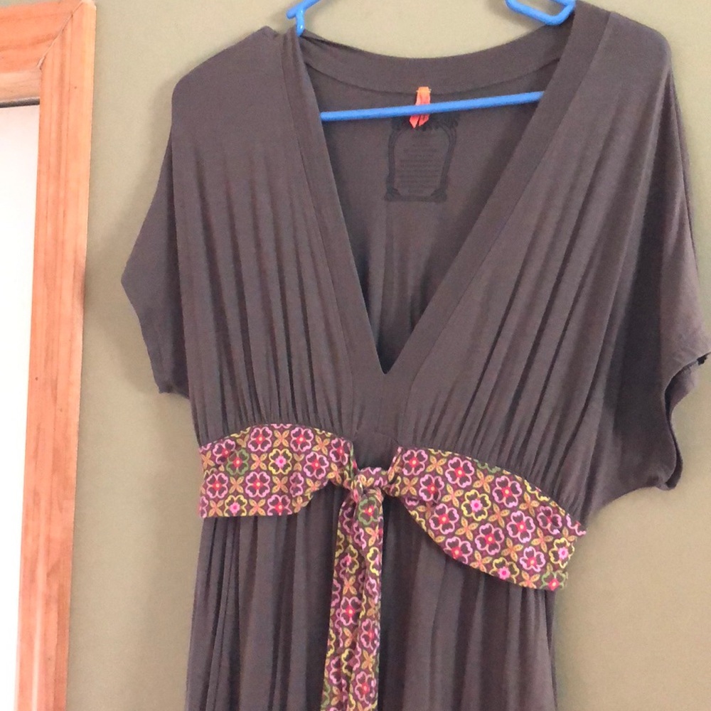 Green dress with floral ribbon belt